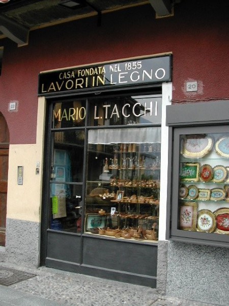 front of a shop selling wooden objects (Works in wood)