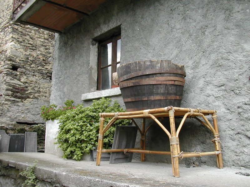 balcony with old barrell, Italian Alpine village