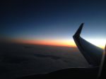 sunset over a plane wing