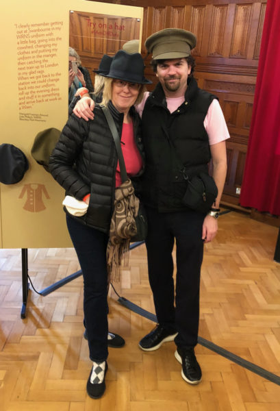 Deirdré and Brendan trying on WWII-era hats at Bletchley Park.