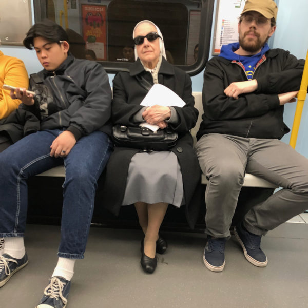 Cool nun on the Milan metro.