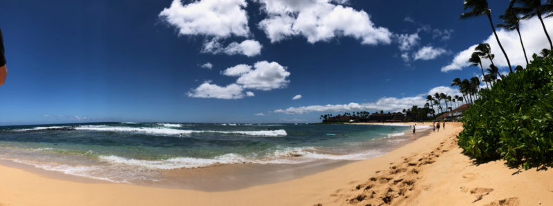 panoramic view of Poipu Beach, Kaua'i.