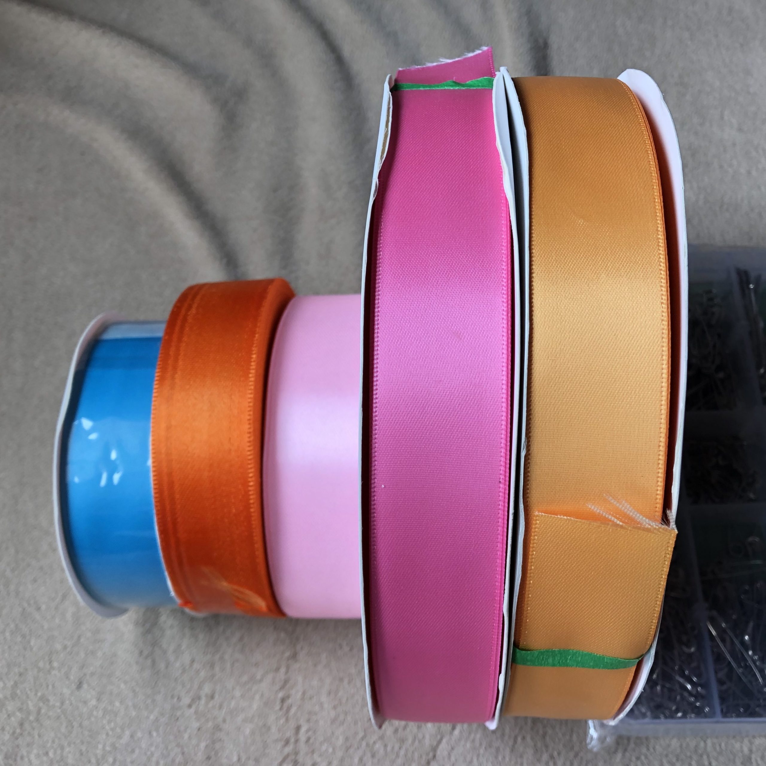 rolls of colored ribbon
