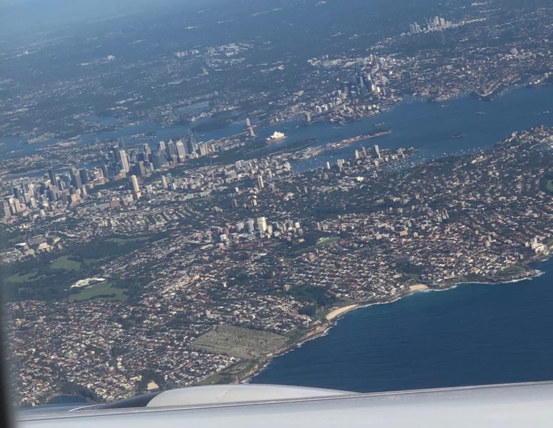 view of Sydney from the air, with the CBD (downtown) and Sydney Opera House