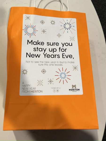 New Year's goody bag that says "Make sure you stay up for New Years Eve - Not to see the new year in, but to make sure this one leaves"