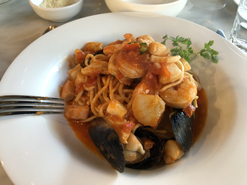 bowl of spaghetti with seafood and tomato sauce