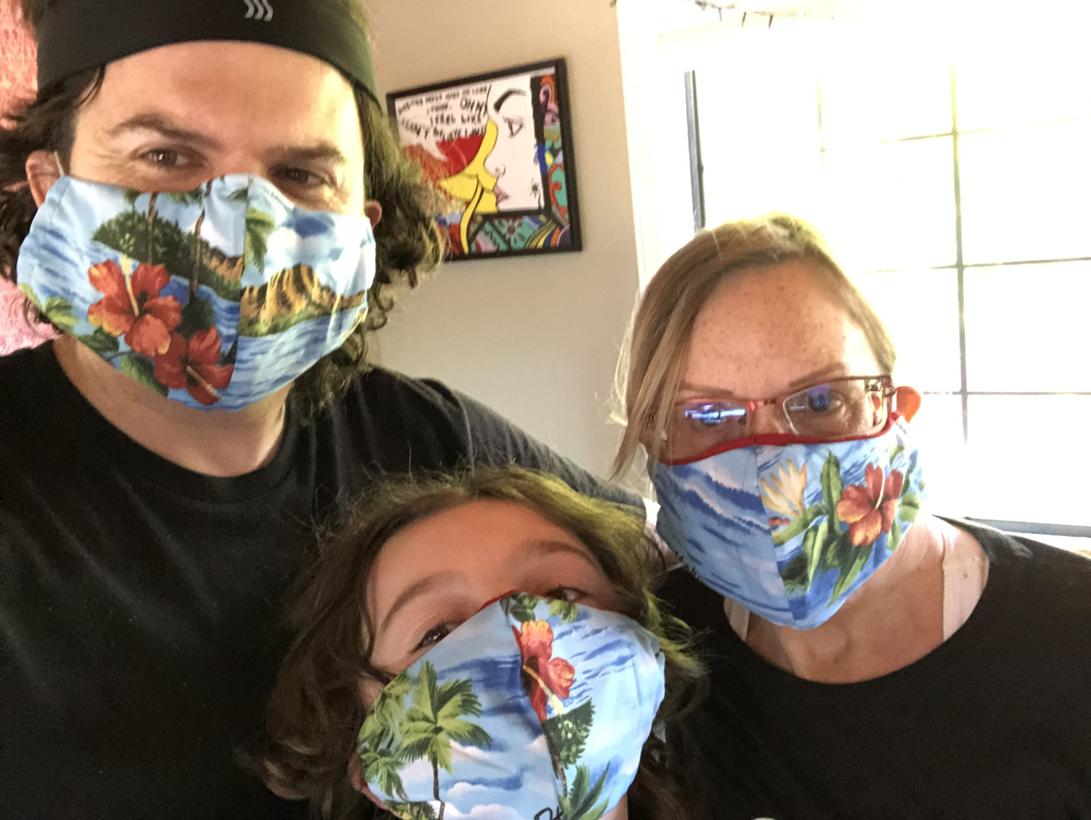 Brendan, Mitchell, and Deirdré wearing matching masks made by Rossella from a Hawaiian shirt