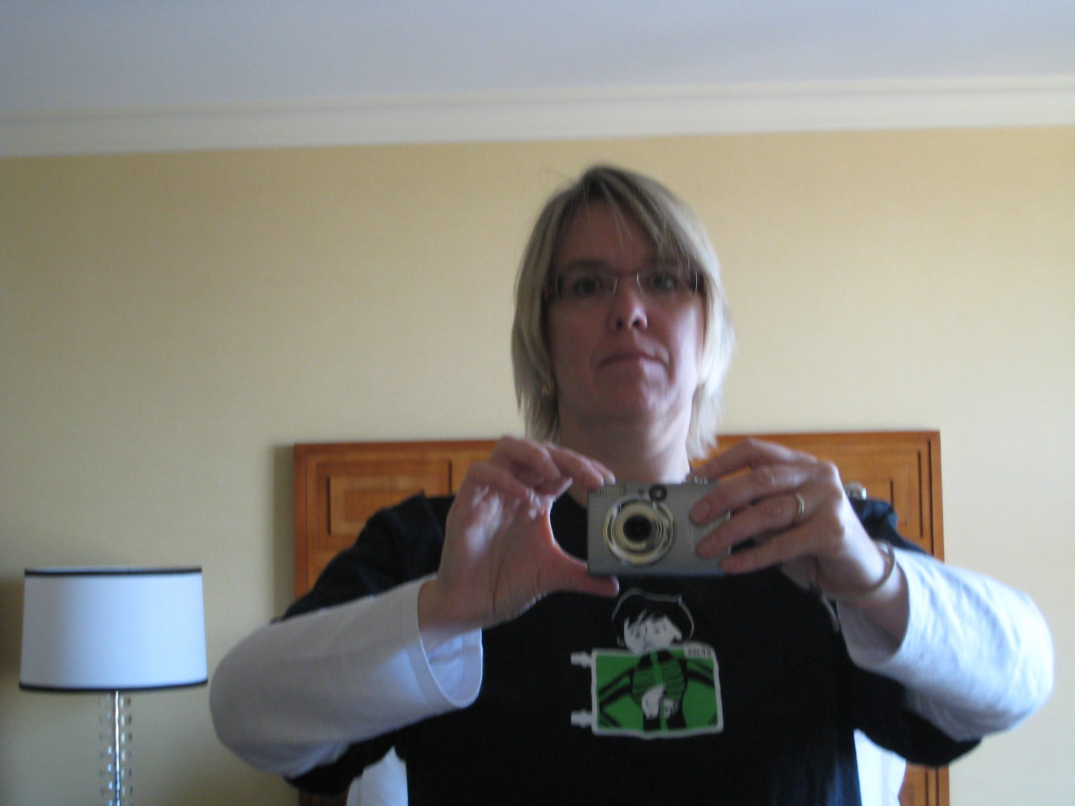 Deirdré in a hotel room, wearing the Joyent DTrace t-shirt