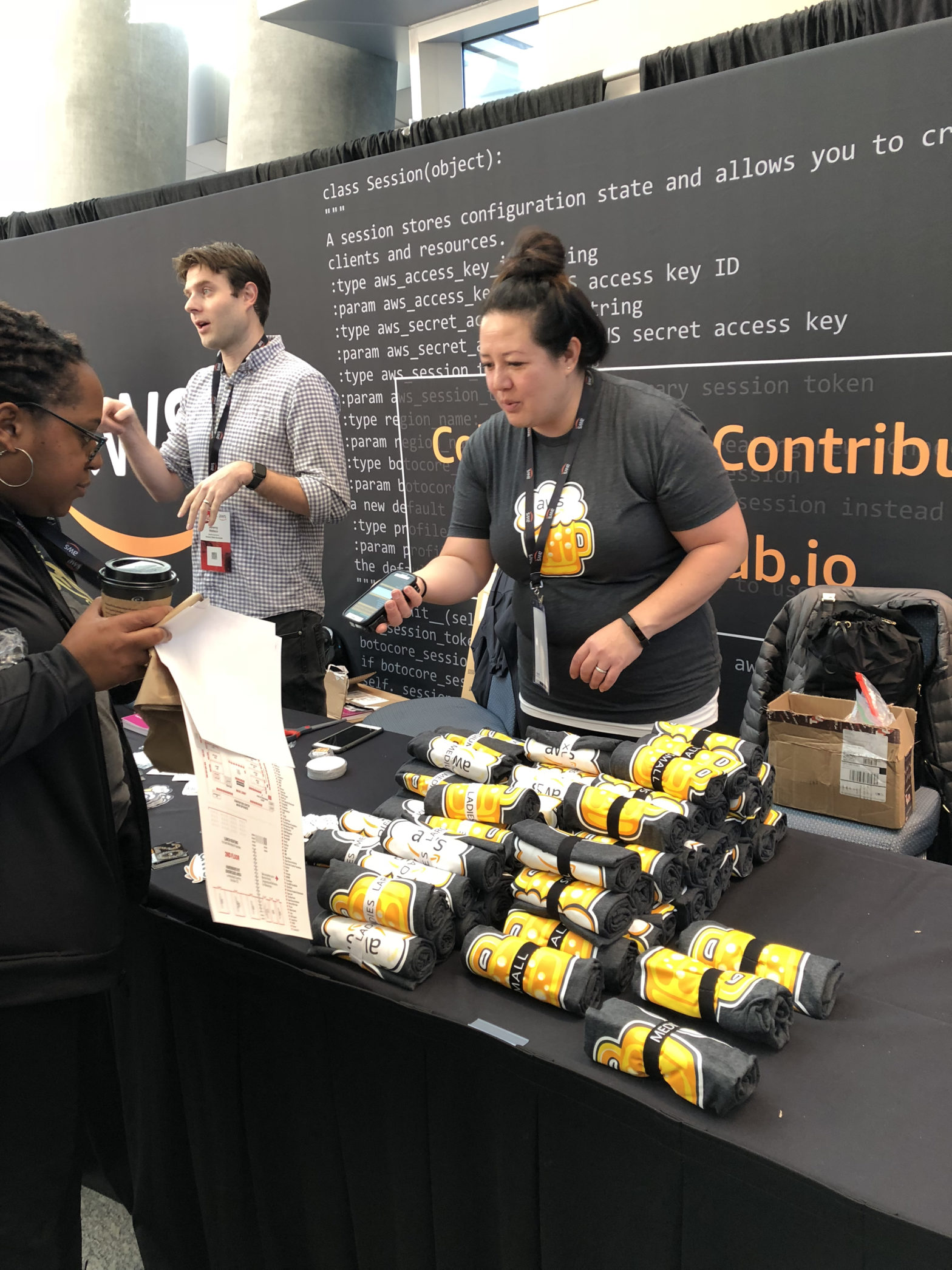 Shirley Bailes handing out t-shirts at All Things Open 2018