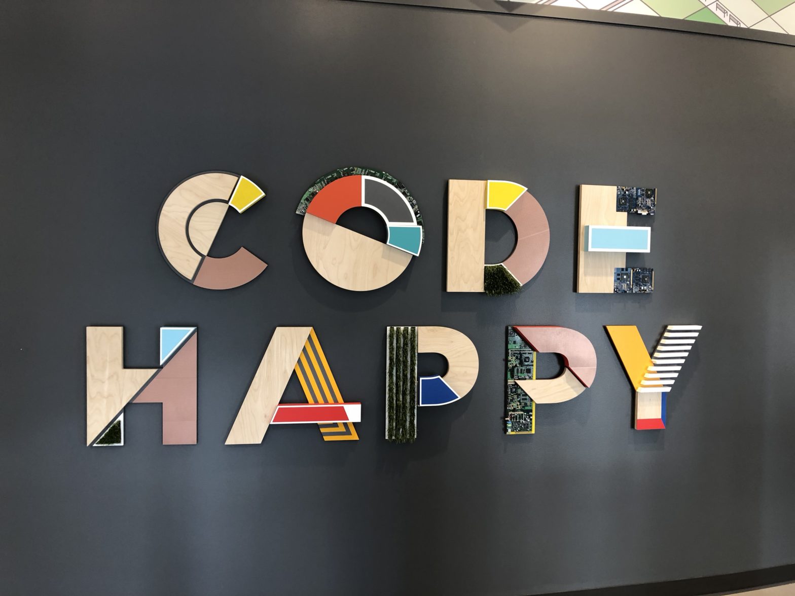 "Code happy" sign at AWS Loft San Francisco