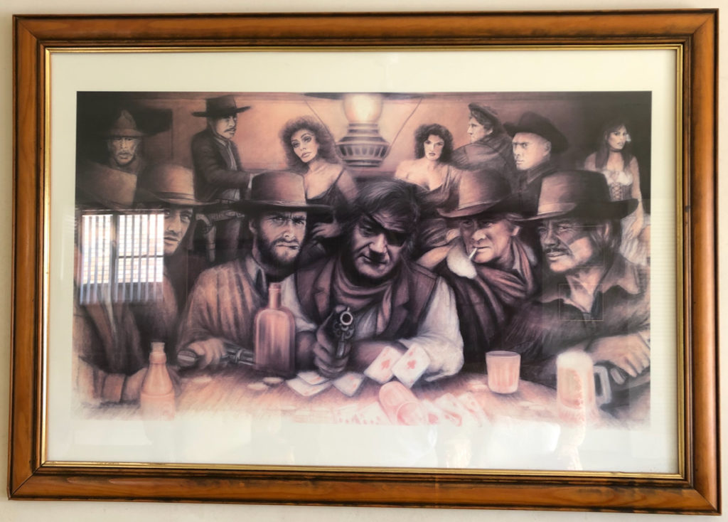 Painting showing a saloon scene with famous Western film stars including Clint Eastwood, John Wayne, Charles Bronson, Yul Brynner...