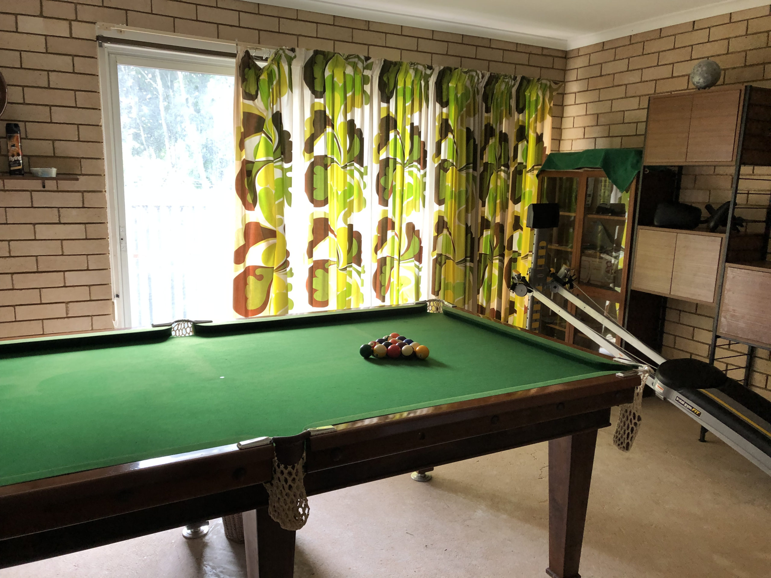 pool table and vintage "Mod" curtains