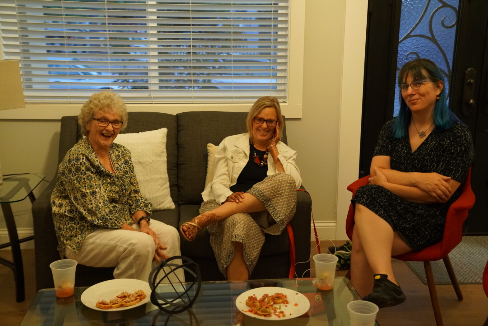 3 women in a living room