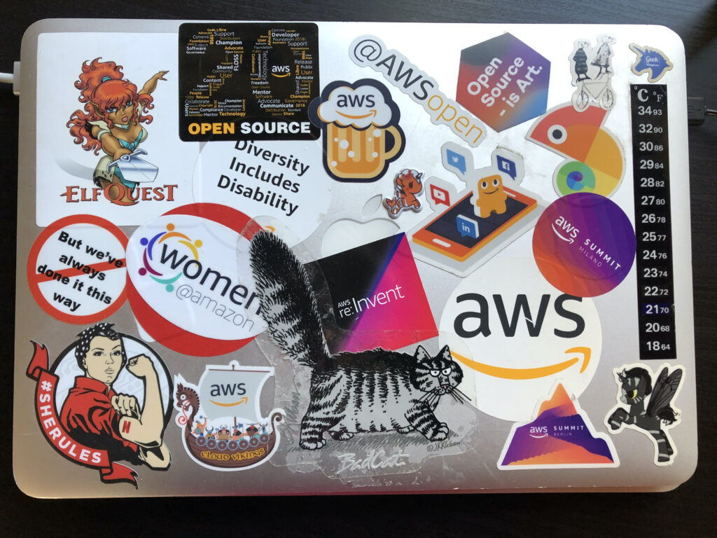 My AWS laptop with various stickers about open source and diversity, plus Elfquest, Kliban, and Gorey
